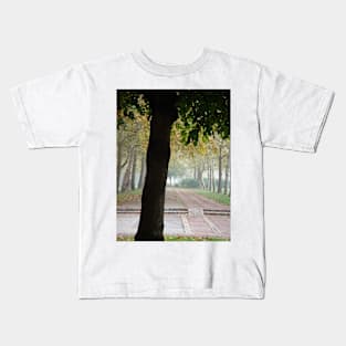 A park on a foggy autumn day Kids T-Shirt